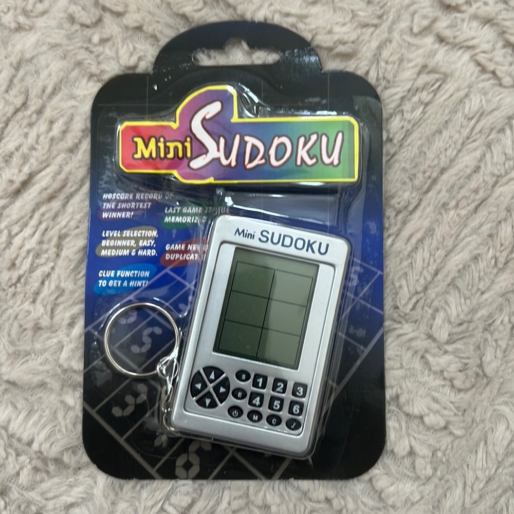 Mini sudoku Keychain Electronic Handheld Travel Game
New in original packaging